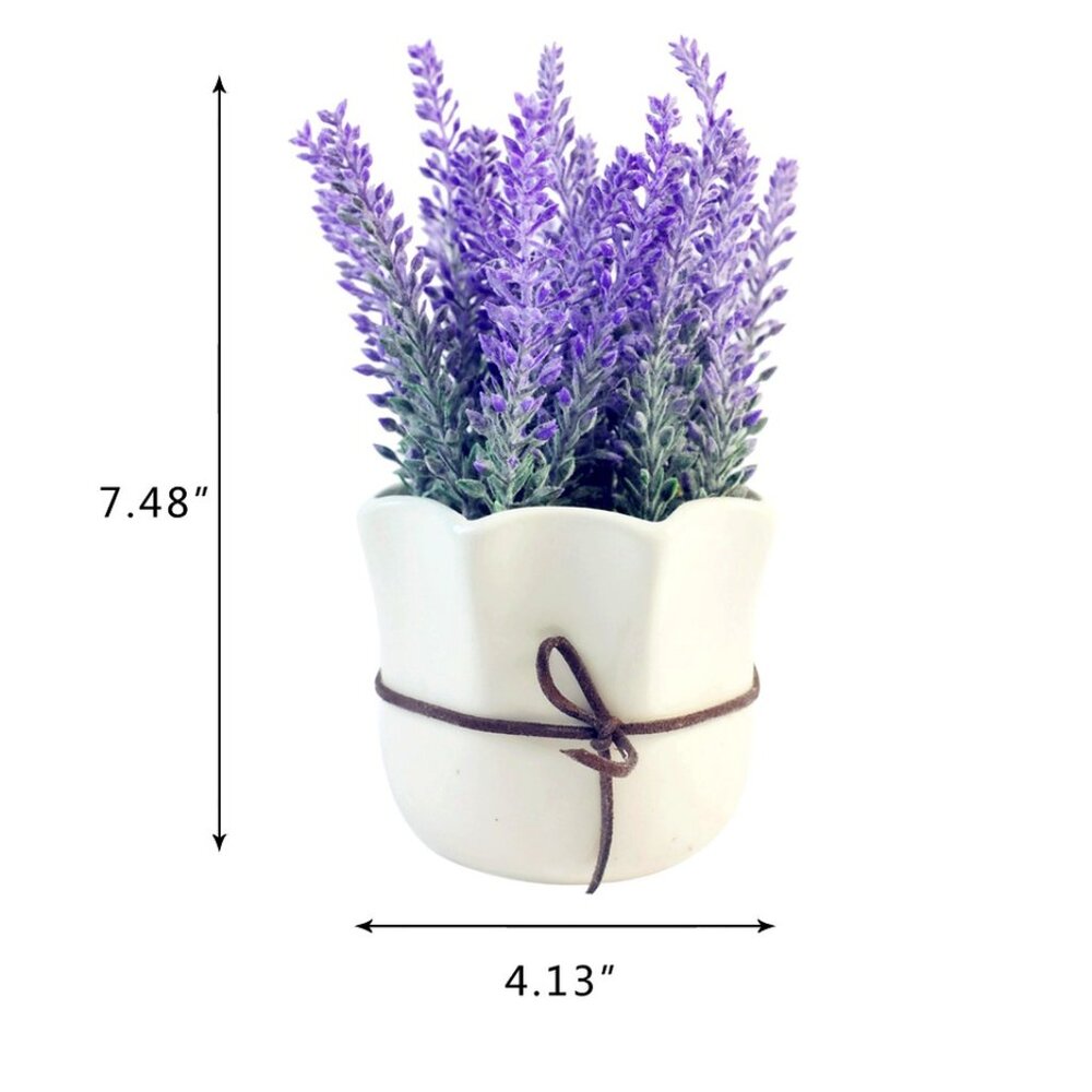 A Tall Artificial Lavender Plant Potted in White Ceramic Pot